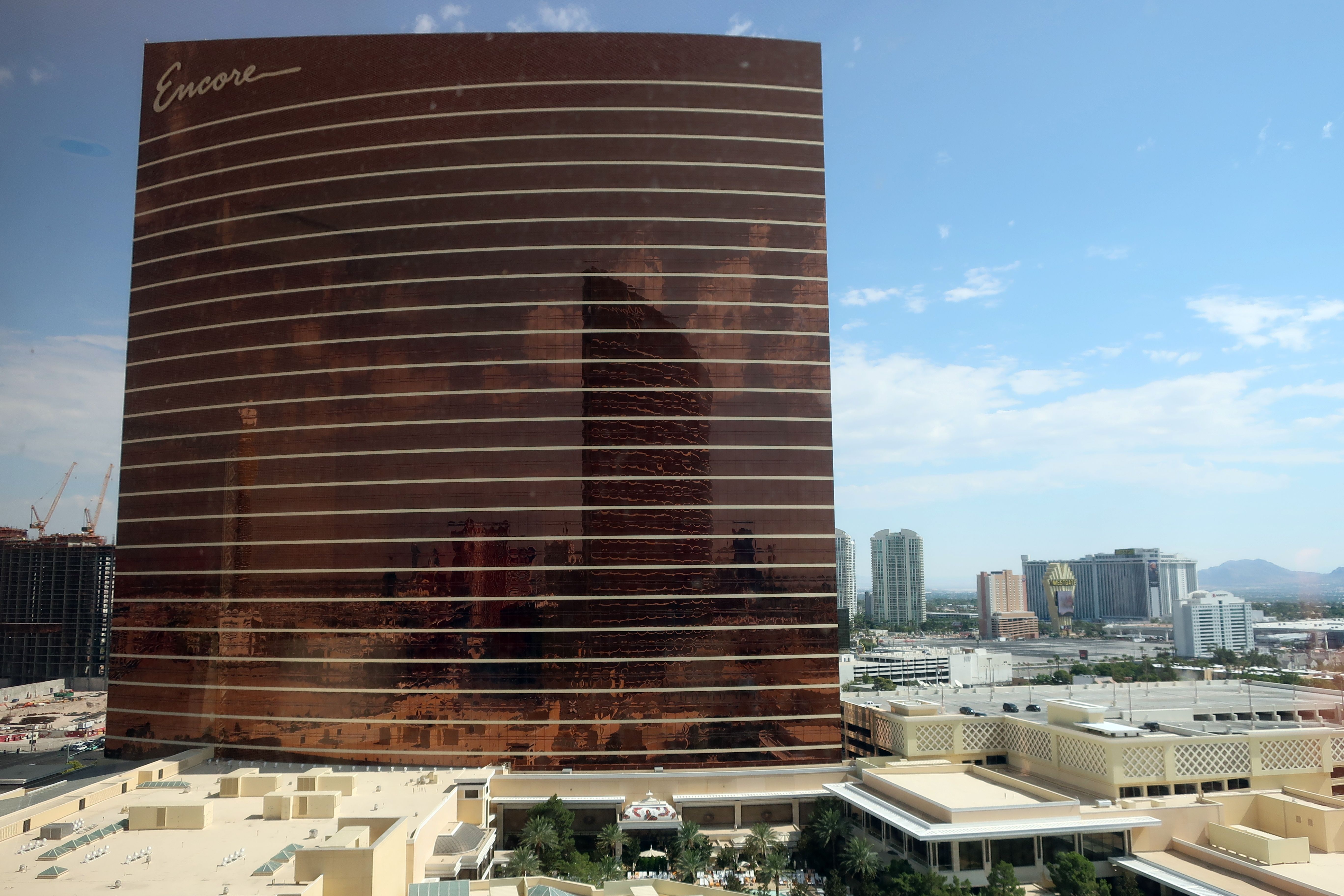 The image shows the Wynn Hotel and Casino in Las Vegas, Nevada. At the bottom of the image, there...