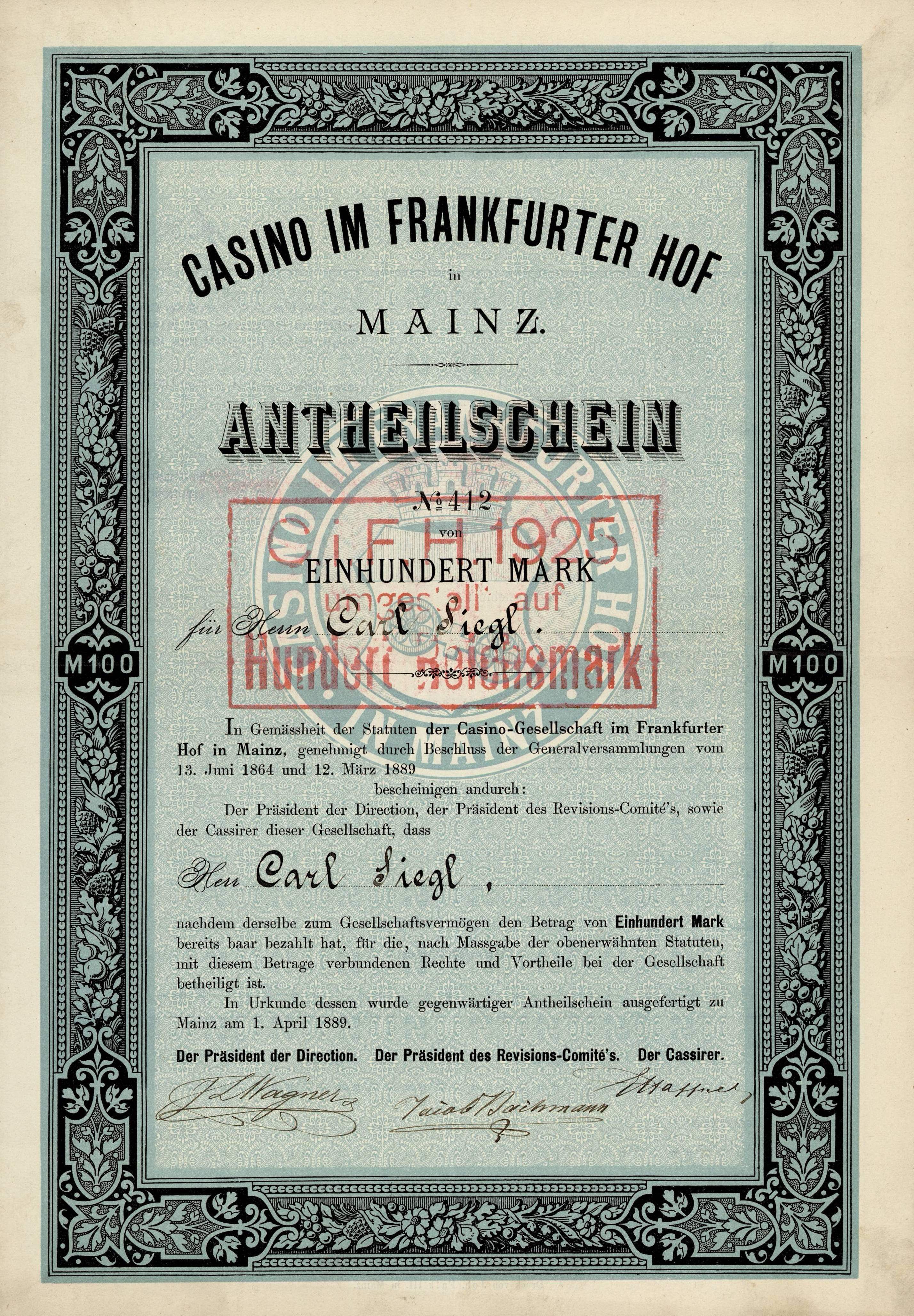 The image shows an old stock certificate with a black border and a red stamp on it. The text on the...