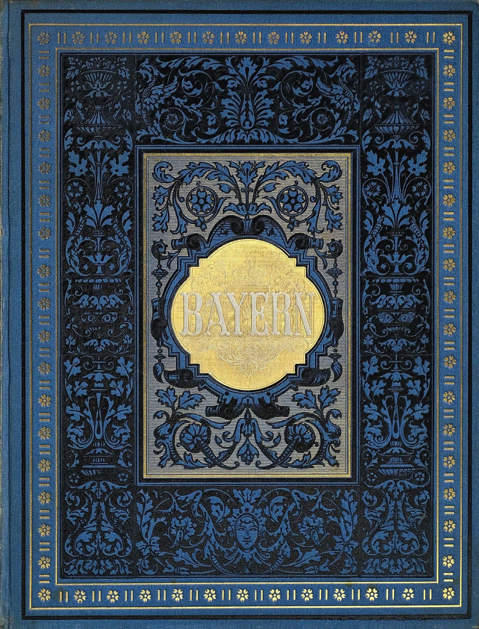 The image shows a blue and gold book with the word "Bayern" written on it. The cover of the book is...
