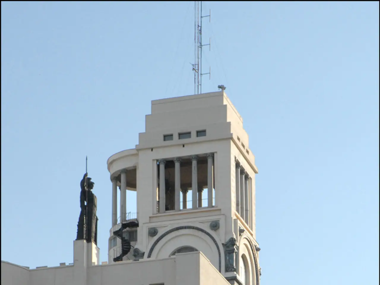 In this image, we can see some buildings, there are some windows on the buildings, at the top there...