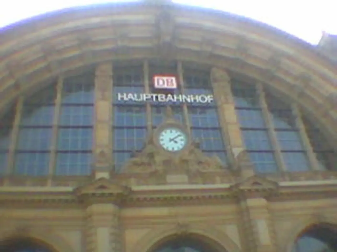 In this picture we can see the building and clock is attached to the building.