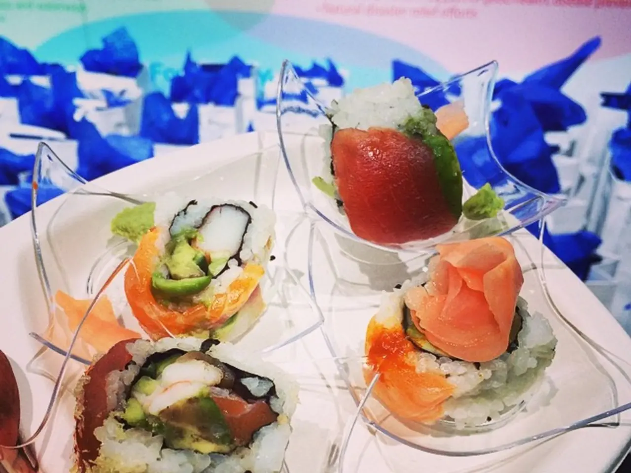 In this picture I can see there is some food placed in a plate and in the backdrop there is a...