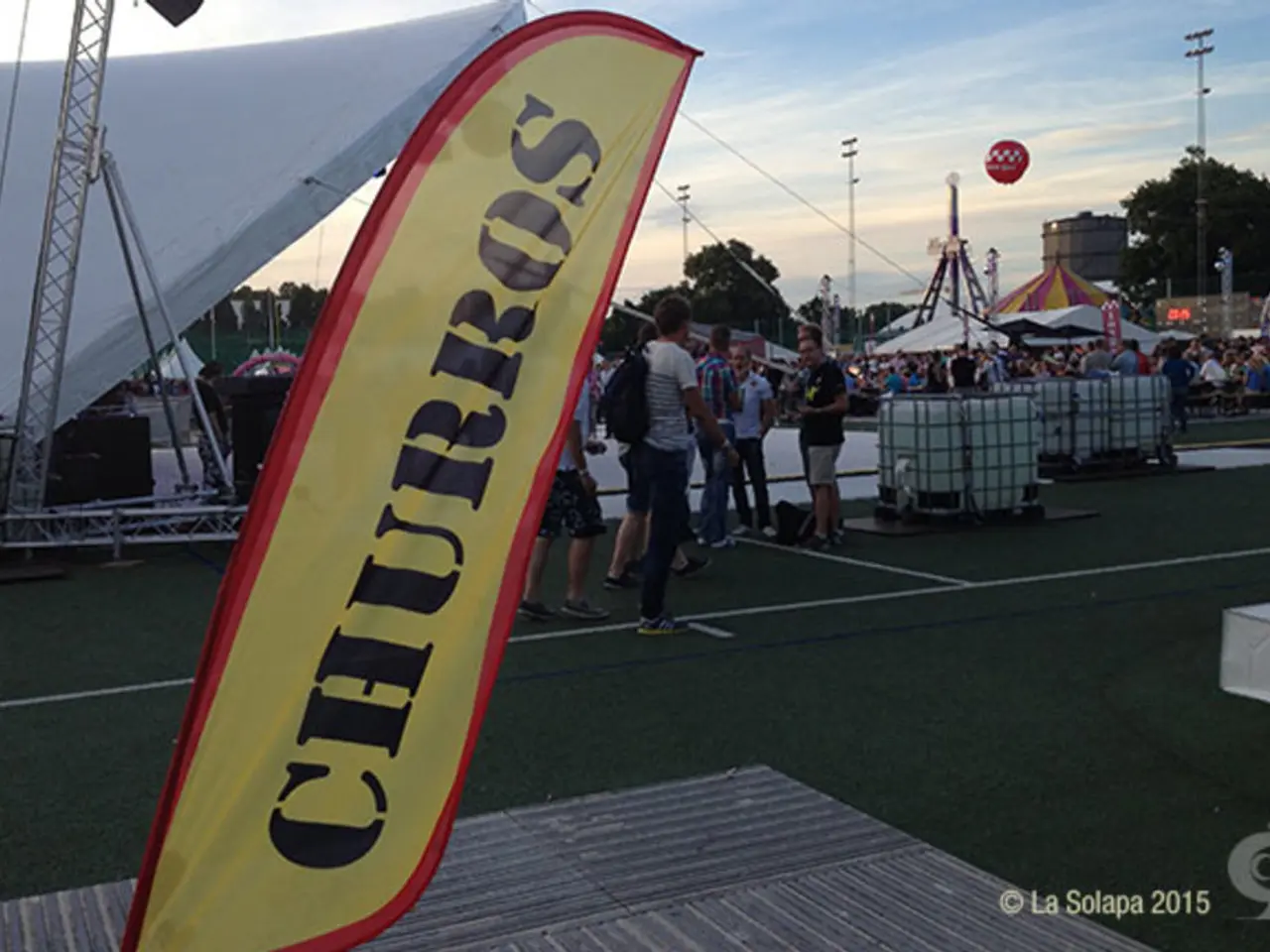 In this image it seems like it is a carnival in which there are tents under which there are so many...