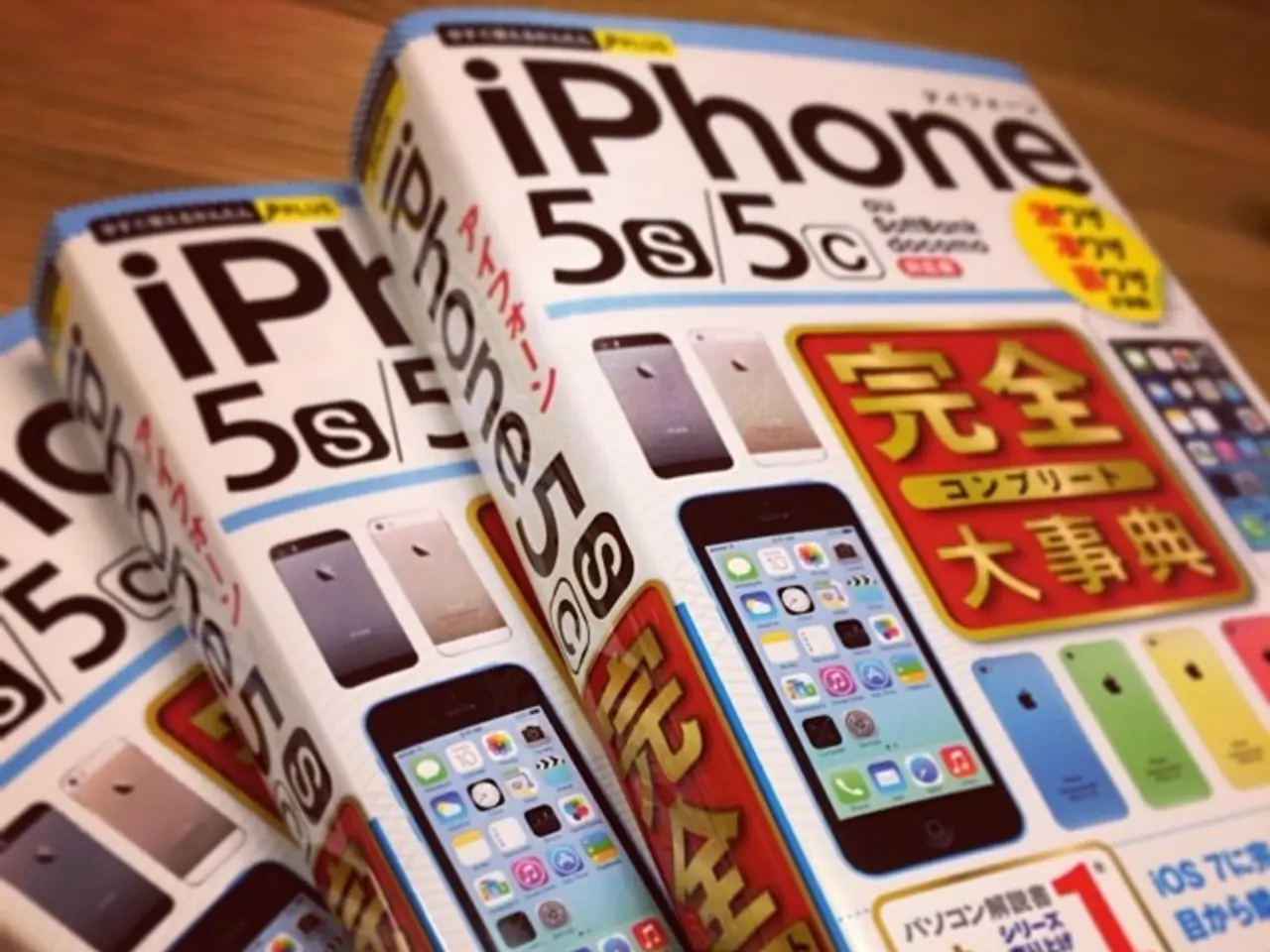 In this image there is a table, on that table there are books.