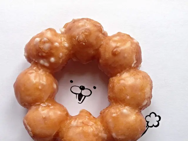 In this image there are sweet balls, Under the sweet balls there is a drawing.