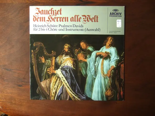 In this picture I can see there is a book and there are some people standing and playing a musical...