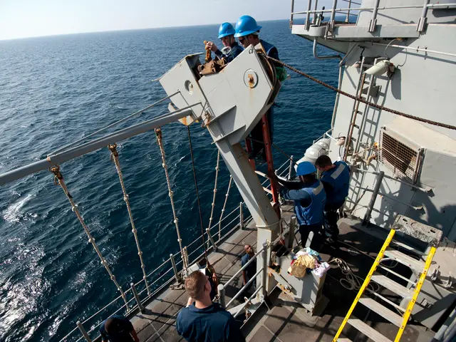 In this picture there is a deck in the image and there are people at the bottom side of the image,...