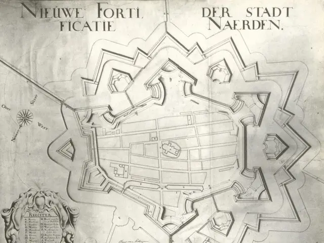 The image shows a map of the city of Niederlande, Germany, with text and a design on a paper. The...