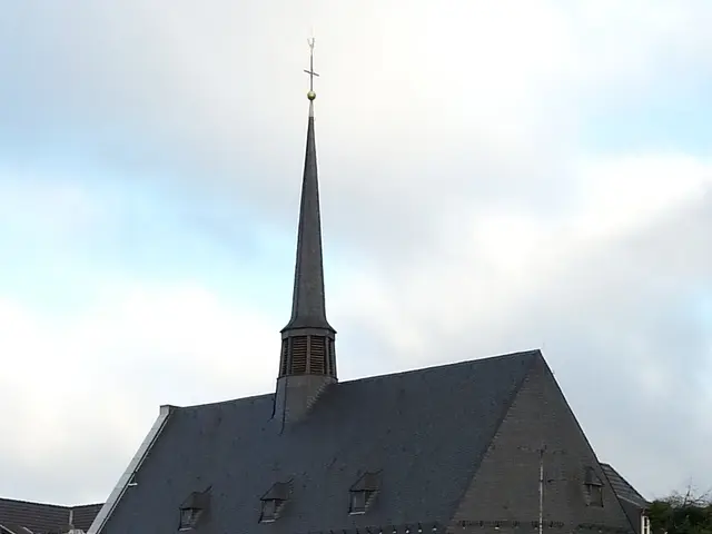 The image shows a church with a steeple in the middle of a small town, surrounded by buildings,...