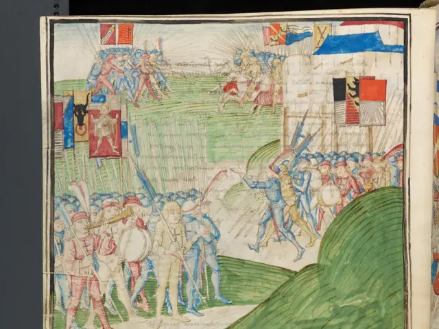 The image shows an open book with a drawing of a battle scene on it. The book is placed on a flat...