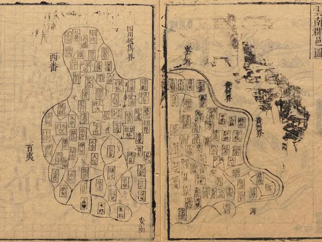 The image shows an old book with Chinese writing on it, depicting a map of a city. The map is...