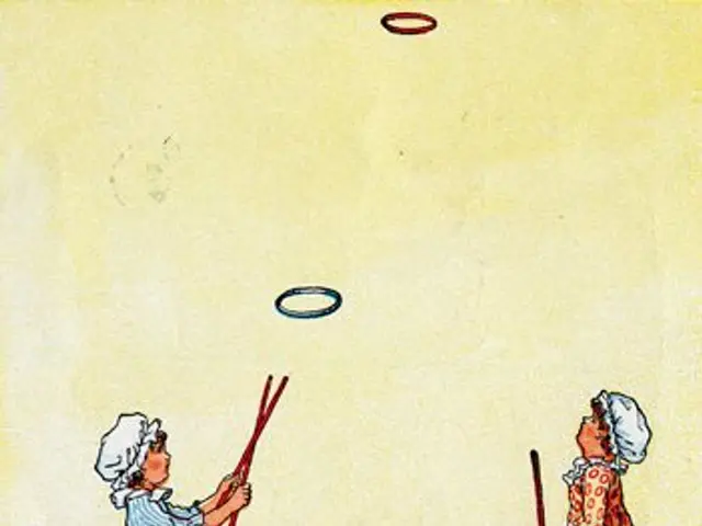 The image shows two children playing with a hula hoop, each holding a stick in their hands. At the...