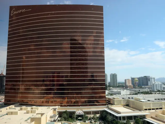 The image shows the Wynn Hotel and Casino in Las Vegas, Nevada. At the bottom of the image, there...