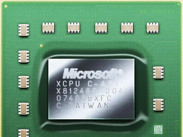 The image shows a close up of a microprocessor chip on a yellow background. The chip is green and...