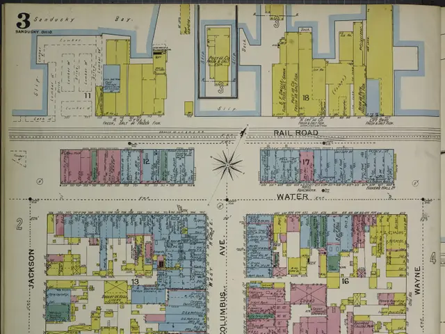 The image shows an old book with a map of the city of San Diego, California. The map is detailed...