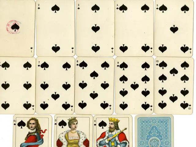 The image shows a deck of playing cards with four of spades on a white background. The cards are...