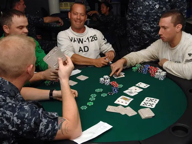 The image shows a group of men sitting around a table playing poker, with coins and cards spread...