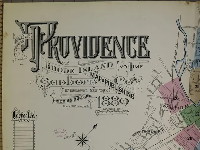 The image shows an old book with a map of Providence, Rhode Island on it. The map is detailed and...