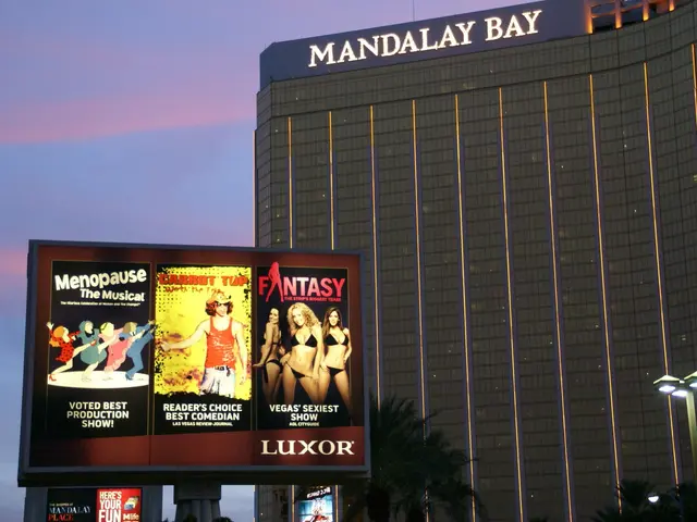 The image shows the Mandalay Bay Hotel and Casino in Las Vegas, Nevada. In the foreground, there is...
