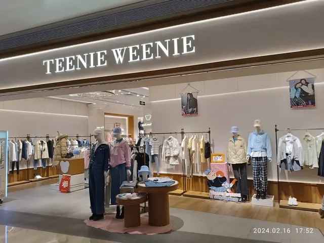 The image shows a teenie weenie store in Hong Kong, with mannequins wearing the latest fashion,...