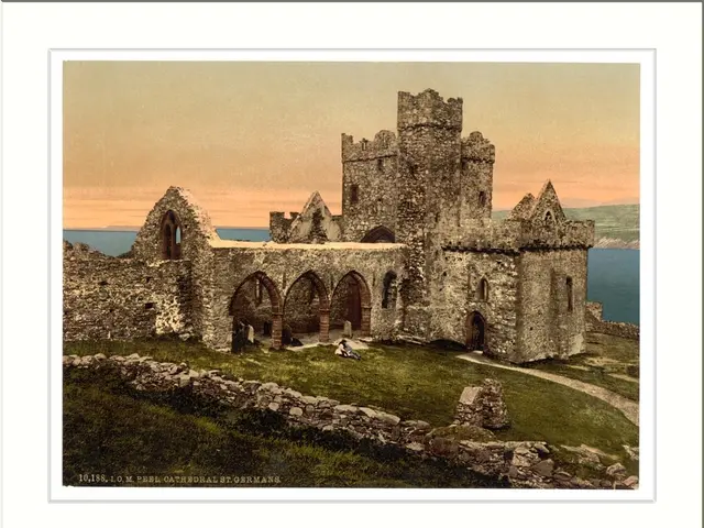 The image shows an old photo of the ruins of a castle in Ireland, framed in a photo frame. The...