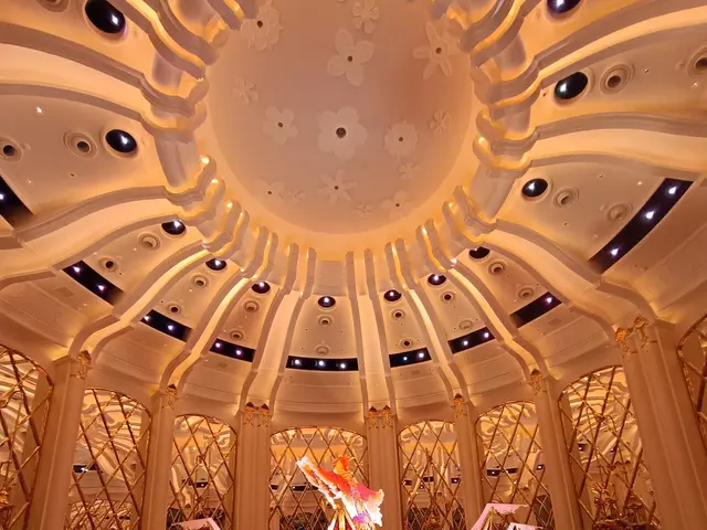 The image shows the inside of the Bellagio Hotel and Casino in Las Vegas, Nevada. There are a few...